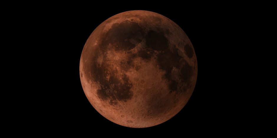 Ein Blutmond, der als rot gefärbter Mond vor einem schwarzen Himmel zu sehen ist.